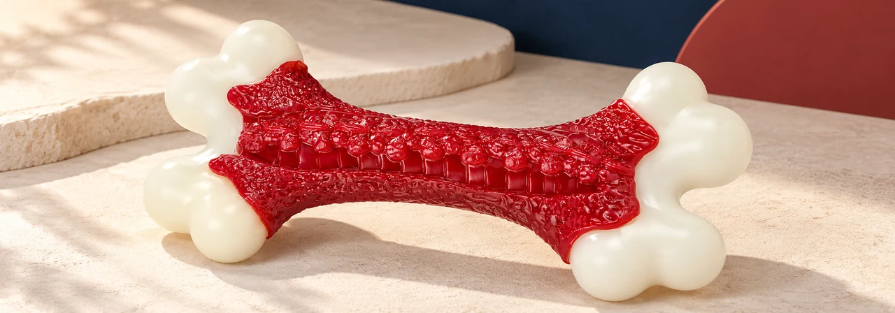 Durable bone-shaped dog chew toy with textured chewing zones